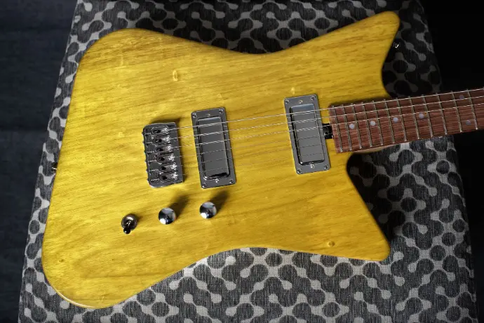 Finished Atomicato guitar by Kevin James Guitars, showcasing custom design, craftsmanship, and unique style.